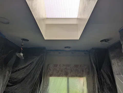 Room masked and protected before ceiling drywall work