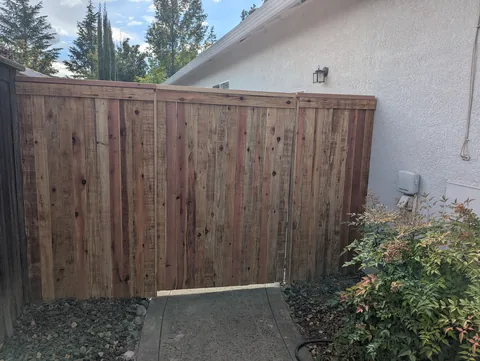 New fence section, gate and posts after replacement