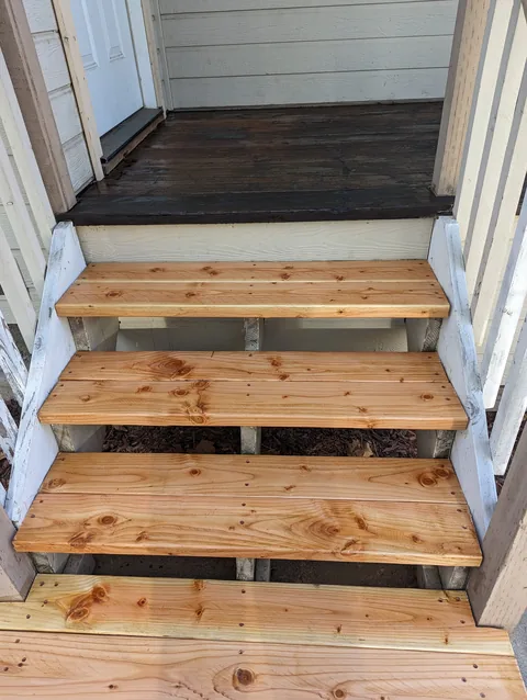 Replaced front entry steps with adjusted risers