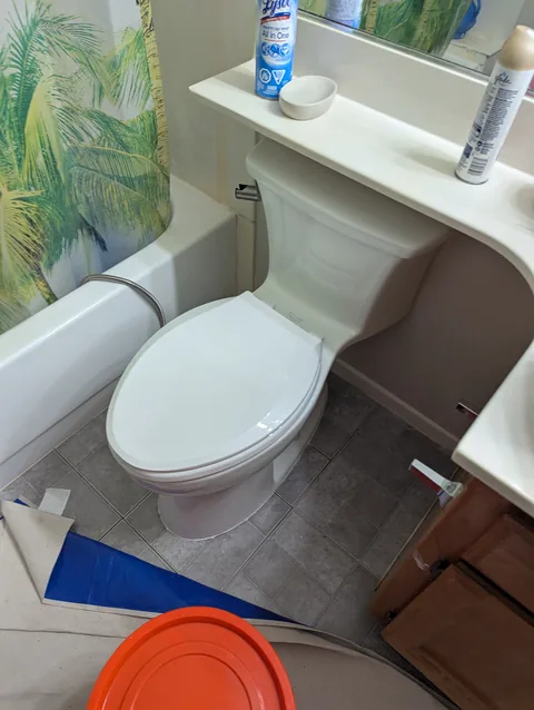 Toilet installed and sealed on a new wax ring